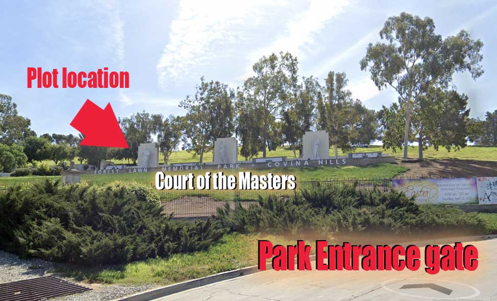 Park entrance gate with arrow marking the plot location near the Court of the Masters statues